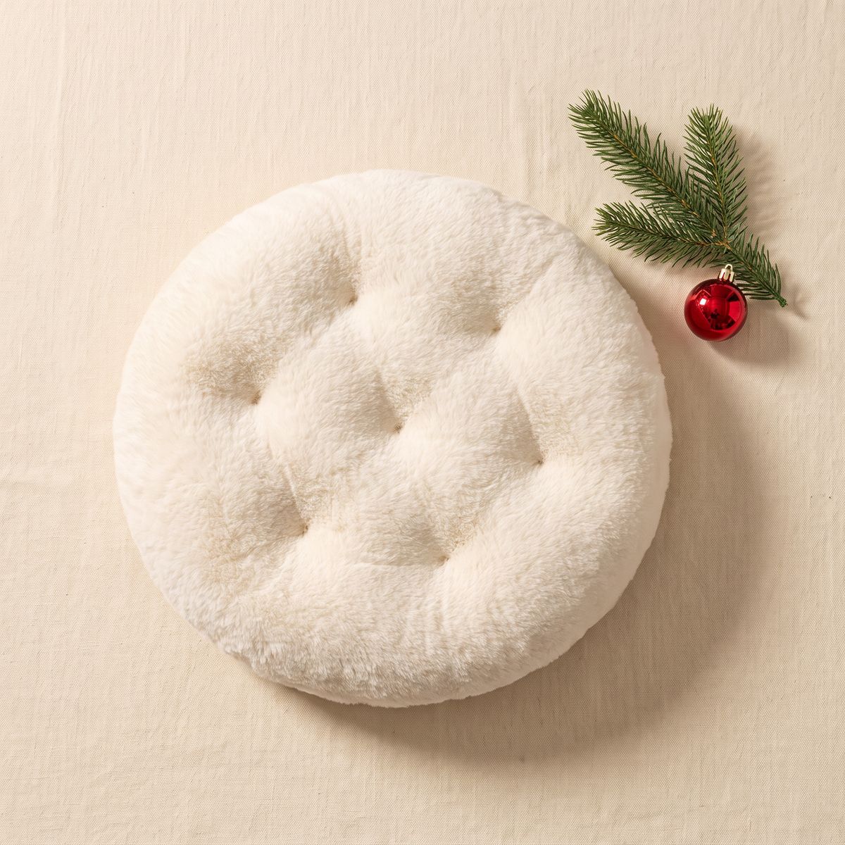 Round cream plush cushion for the Purrcradle basket